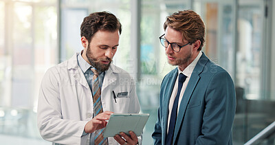 Buy stock photo Doctors, men and tablet with planning at clinic, insight and discussion with review in lobby. People, hospital director and team with tech, app and checklist with report for healthcare services