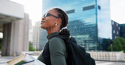 Buy stock photo Black woman, student and happy in city, thinking and travel with glasses, backpack and books for learning. African person, smile and reflection with bag, education or inspiration at university campus