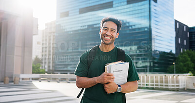 Buy stock photo City, portrait and smile of student man outdoor for commute to college, school or university. Books, buildings and education with happy person in urban town for development, learning or travel