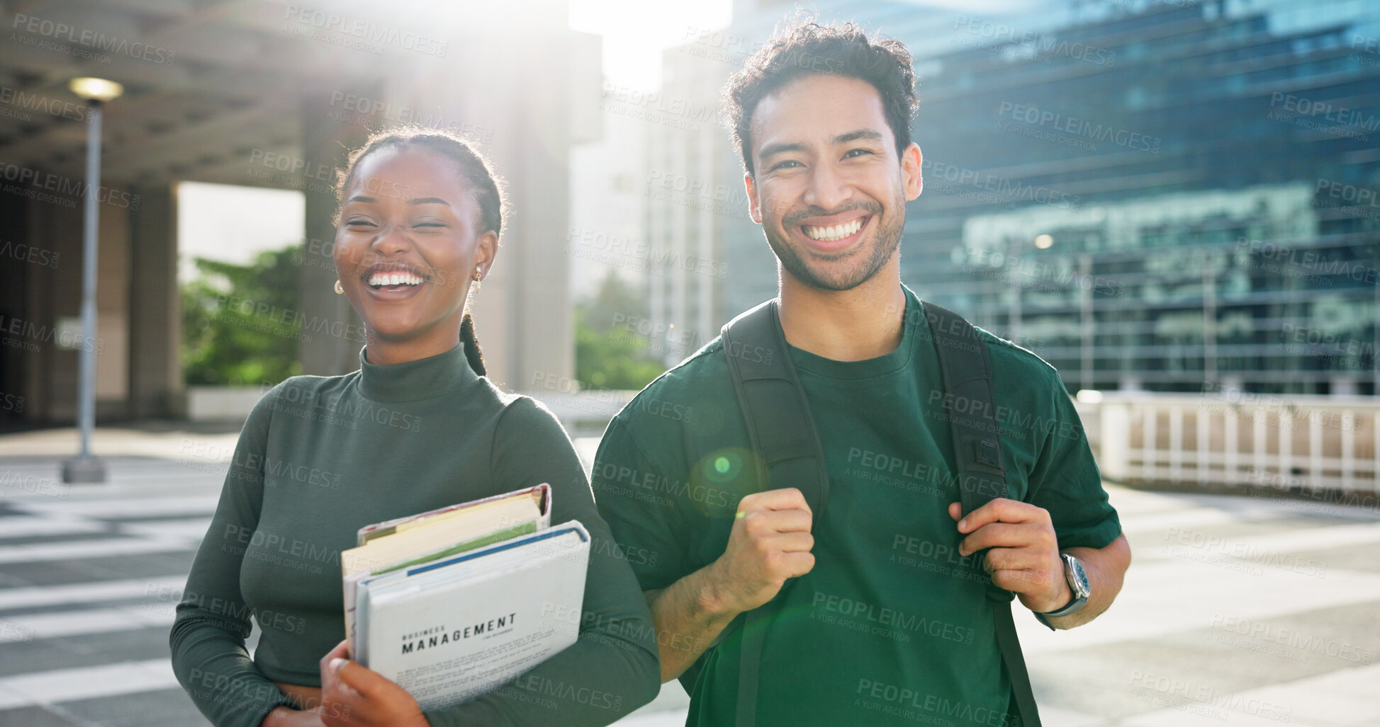 Buy stock photo Happy people, students and portrait with books in city for higher education or learning journey. Man, woman or academic friends with smile or textbooks for knowledge, travel or commute in urban town