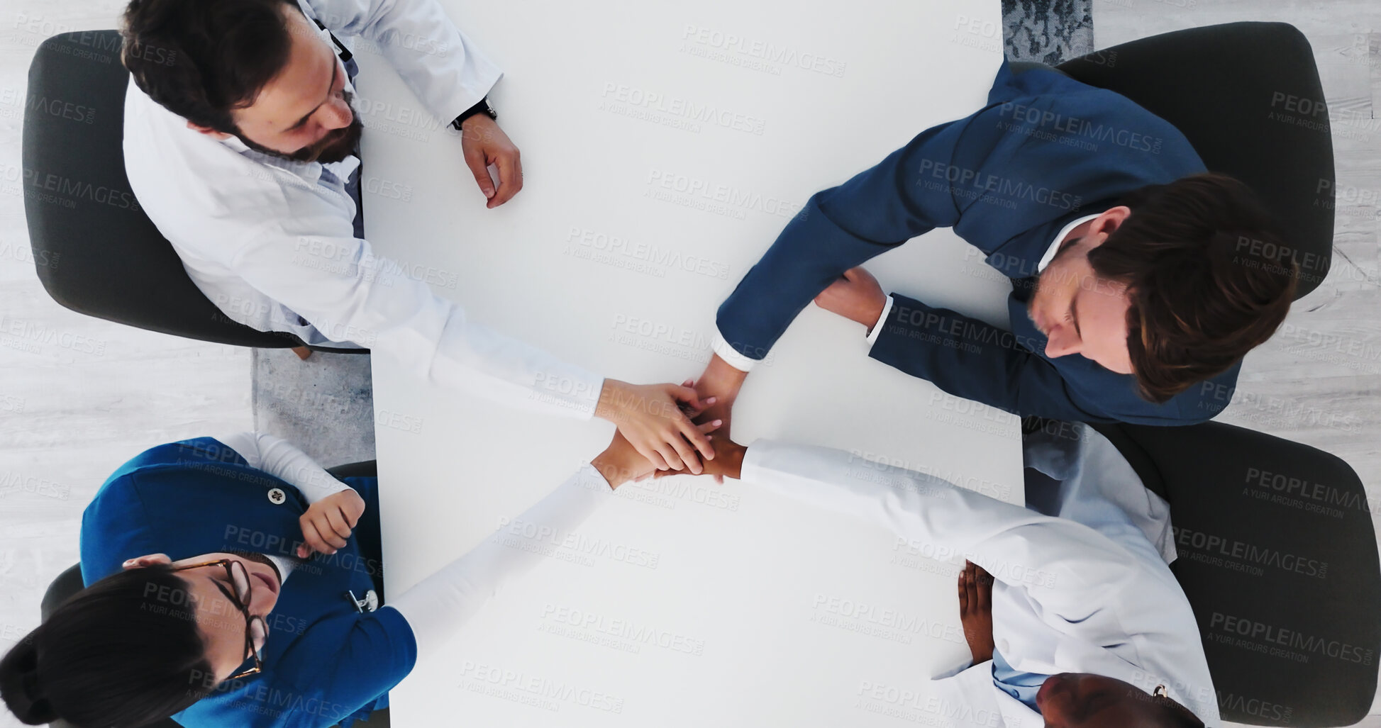 Buy stock photo Doctors, hands together or motivation for healthcare funding, hospital budget increase or achievement. Teamwork, above or people celebrate for medical sponsorship, collaboration or staff solidarity