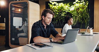 Buy stock photo Design, laptop and typing with business man in coworking office for development or planning. Computer, online research and review with designer person in workplace for digital agenda or schedule