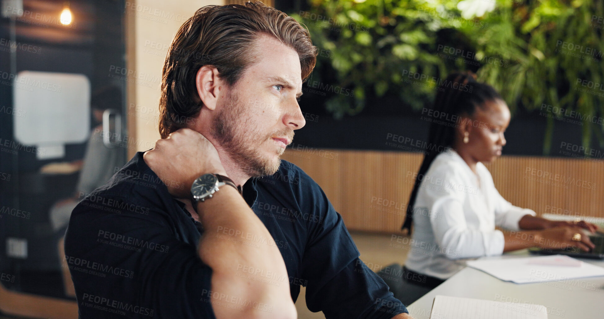 Buy stock photo Man, neck pain and stress with injury at startup, coworking and muscle fatigue at media company. Person, joint ache and frustrated with strain, exhausted and burnout with project at creative agency
