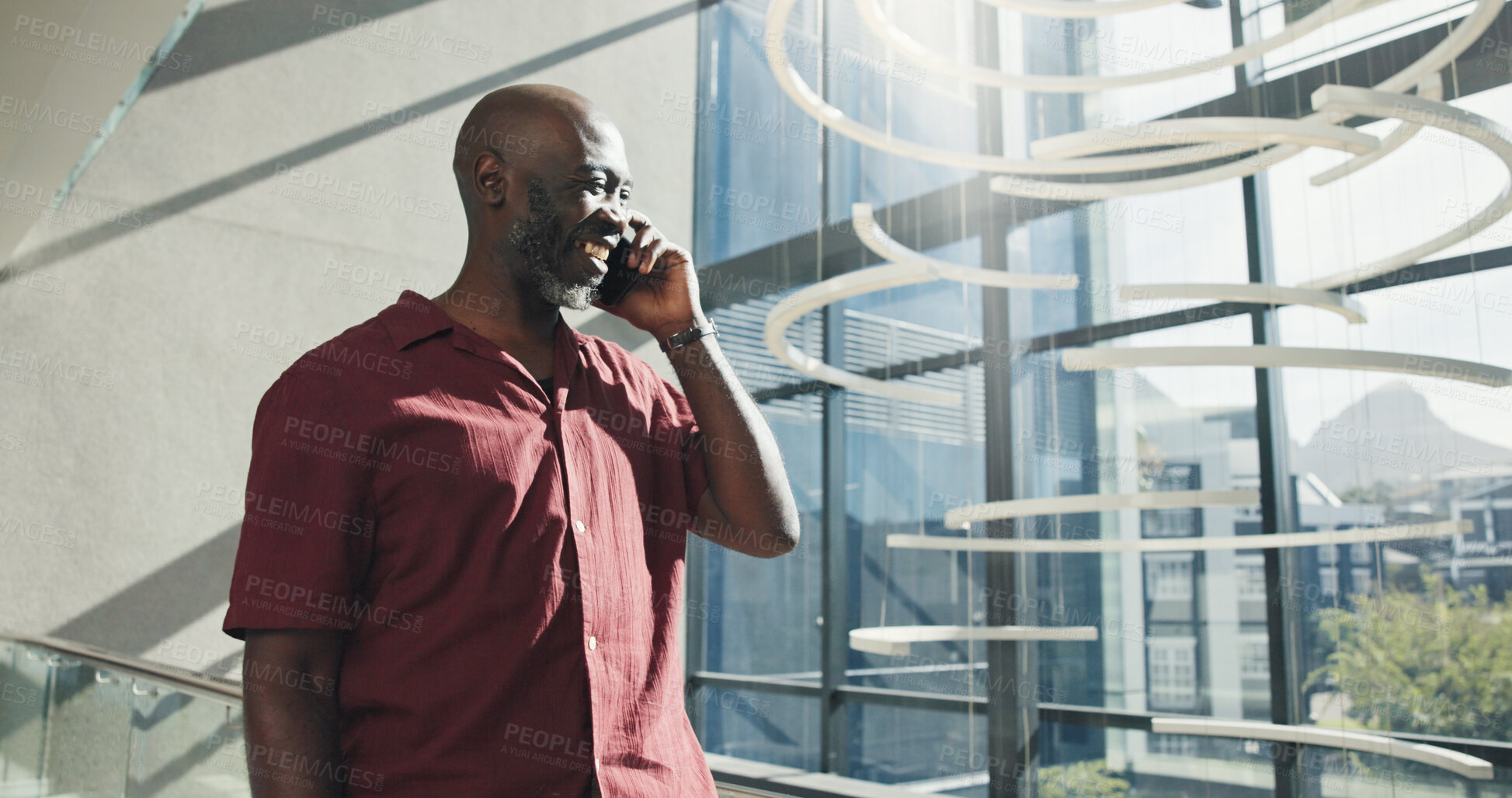 Buy stock photo Phone call, smile or businessman talking in hallway, investment opportunity or acquisition proposal. Negotiation, flare or mature black person with mobile for networking, venture or contract details