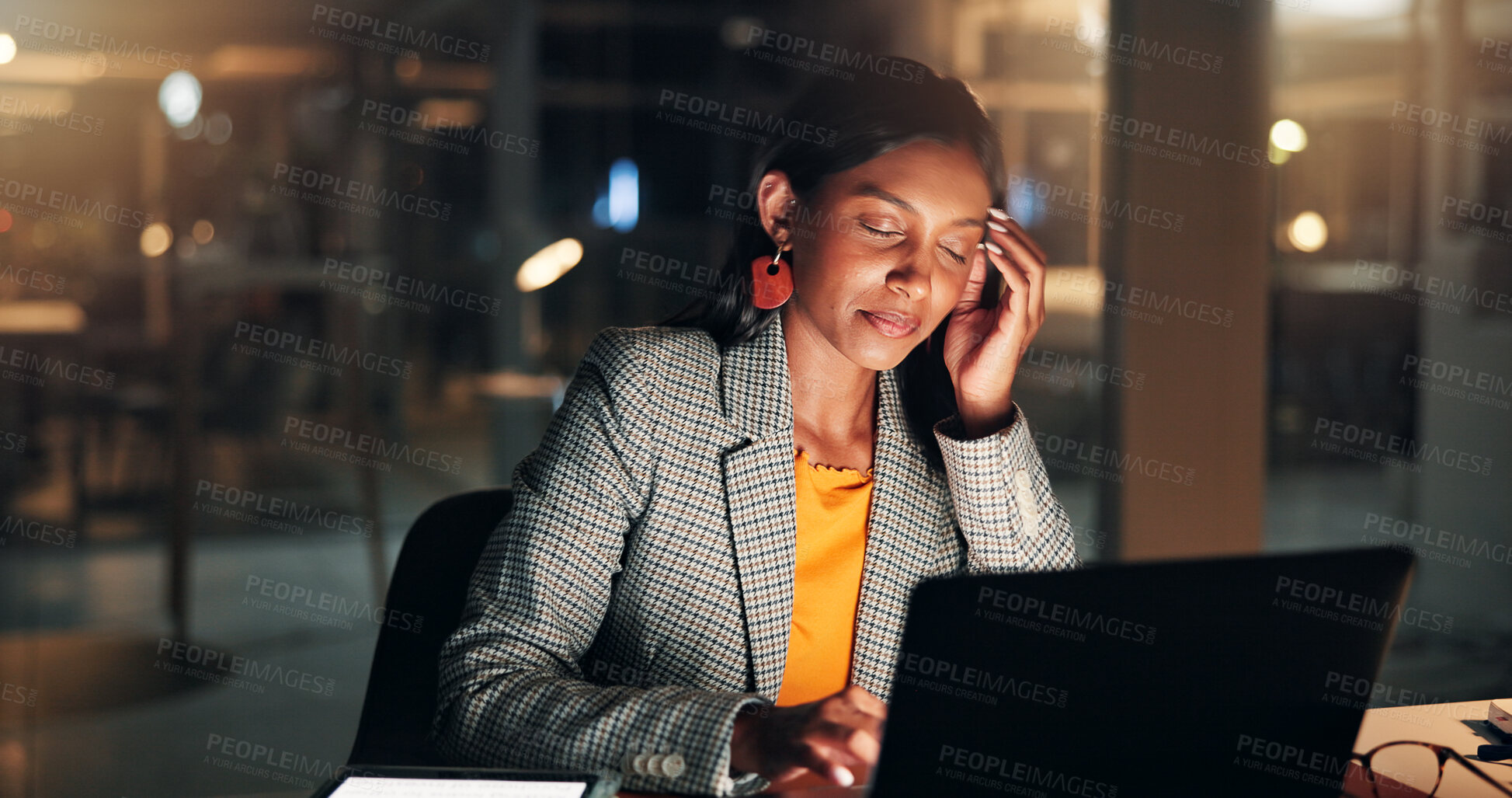 Buy stock photo Stress, headache and businesswoman in office at night with finance report for budget with deadline. Overtime, laptop and female financial manager with stock market crash for investment in workplace.