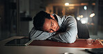 Night, man and tired with sleeping in office for article burnout, mental fatigue and editing break. Late, exhausted journalist and nap at media agency with low energy, resting and overworked on blog