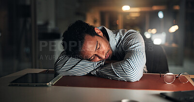 Buy stock photo Night, man and tired with sleeping in office for article burnout, mental fatigue and editing break. Late, exhausted journalist and nap at media agency with low energy, resting and overworked on blog