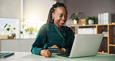 Buy stock photo Credit card, laptop and black woman in office for online shopping, internet banking and payment. Fintech, workplace and person on computer for purchase, business transaction and company expense