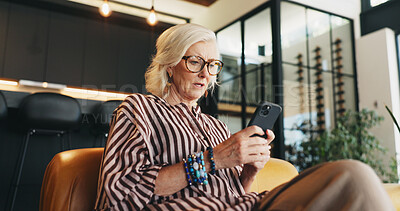 Buy stock photo Home, smartphone and woman on sofa, low angle and message to contact, upset or mistake. Online reading, email or mature person with cellphone, phishing scam or app for social media or website info