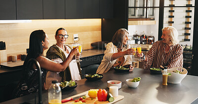 Buy stock photo Mature, happy women or friends cheers with orange juice in kitchen for breakfast gathering or start. Vegan group, female people or toast with drink for morning reunion or social celebration in home