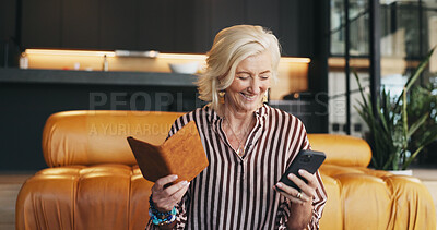 Buy stock photo Happy woman, passport and typing in home with phone, travel plan or booking ticket for overseas trip. Mature person, smile and ID with tech, airline website and registration for international flight.