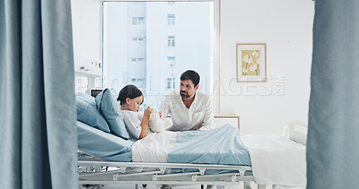 Buy stock photo Conversation, father or girl in hospital bed, healthcare or wellness for recovery support. Man, dad or daughter in clinic, treatment or healing for illness, talking or post surgery with teddy bear