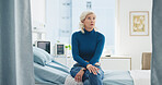 Mature woman, thinking or waiting on hospital with worry, contemplation or appointment for test results. Person, reflection or concern in medical clinic for disease diagnosis, consultation or checkup