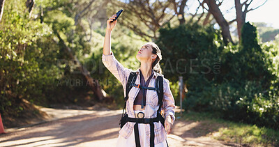 Buy stock photo Woman, phone and hiking in forest with lost signal, search and stress for location on adventure. Person, smartphone and digital map for trail, direction or confused with doubt for trekking in woods