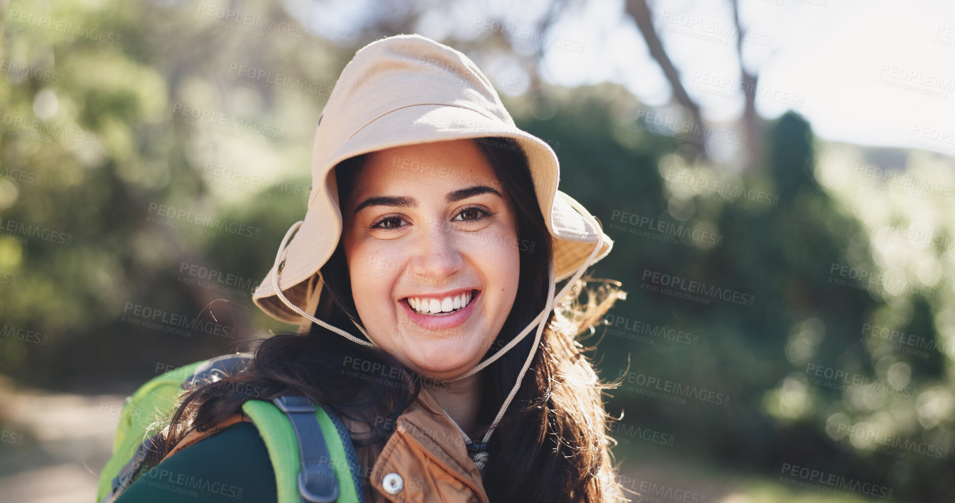Buy stock photo Hiking, portrait and smile of woman outdoor in woods for backpacking, fitness or trekking activity. Exercise, hat and travel with happy hiker person on trail in forest or nature for adventure hobby