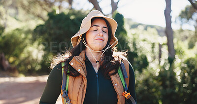 Buy stock photo Woman, smile and thinking with hiking in forest for adventure, inspiration and getaway on holiday. Person, happy and eyes closed in woods for reflection, break and outdoor for trekking in summer
