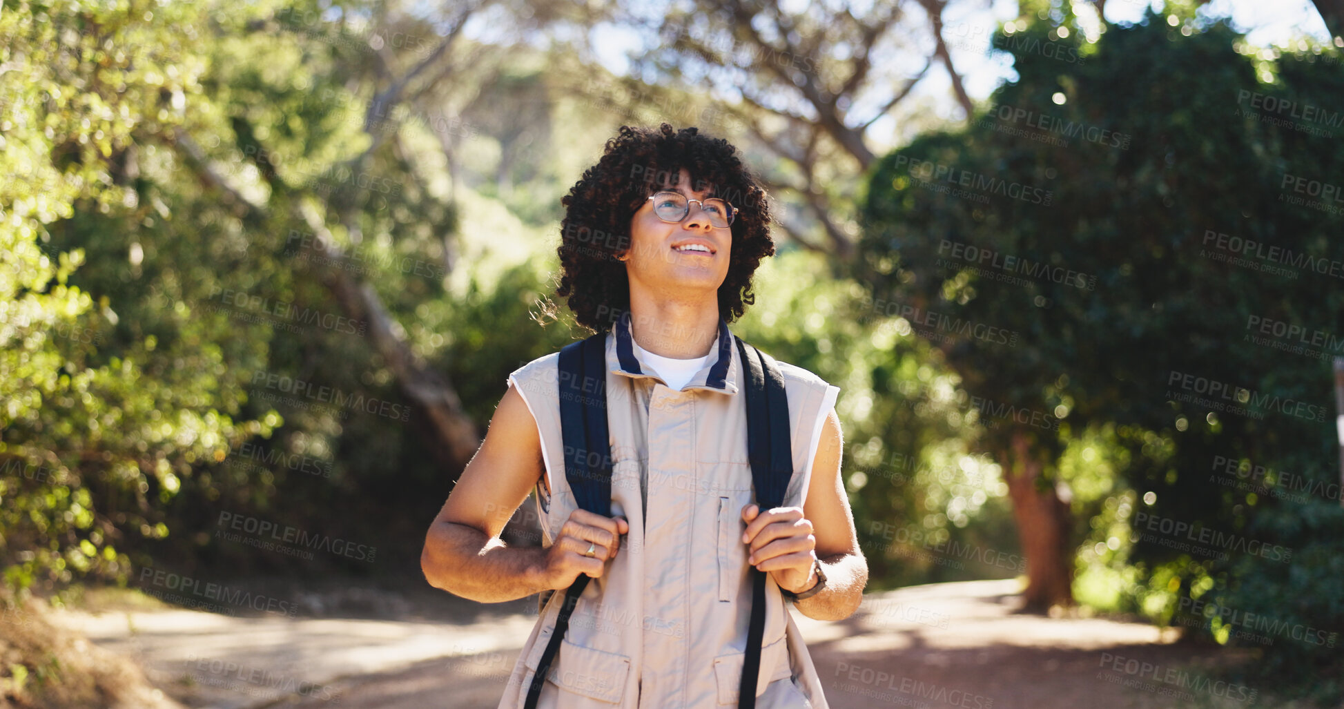 Buy stock photo Thinking, man and hiking with smile outdoor for travel, adventure and sightseeing on holiday. Happy, person and backpacking with reflection, trekking view and explore nature for vacation in forest