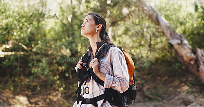 Buy stock photo Thinking, woman and hiking for fitness in woods for travel, adventure and sightseeing on holiday. Bokeh, person and backpacking with reflection, trekking view and explore nature on vacation in forest