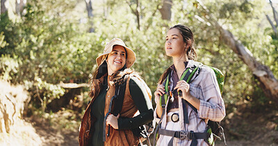 Buy stock photo Conversation, hiking and travel with female friends outdoor in forest for hobby or journey. Backpacking, trekking and walking with hiker women on trail in nature together for adventure or bonding