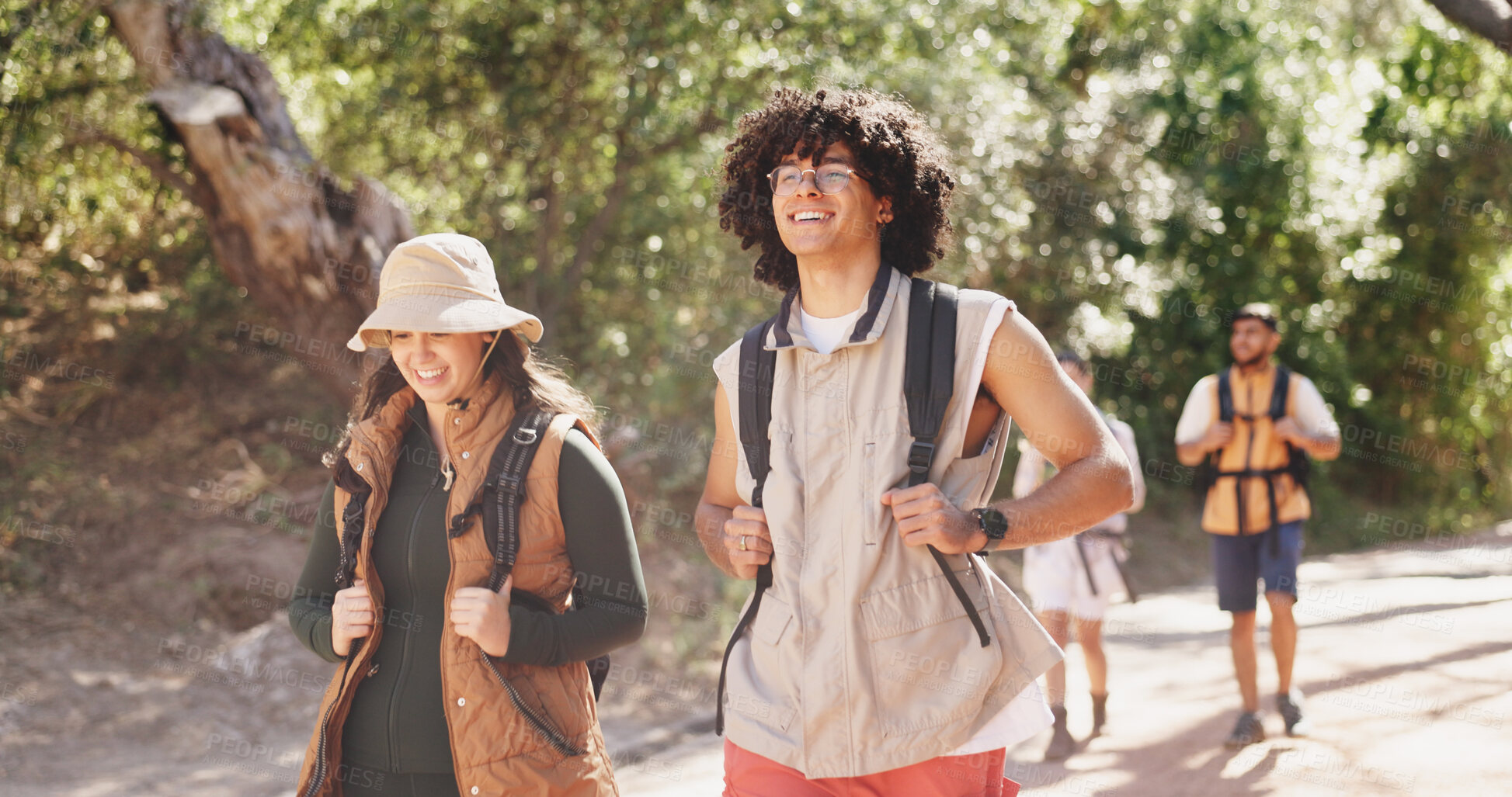 Buy stock photo Hiking, smile and travel with couple of friends outdoor in forest for hobby or journey. Backpack, trekking and walking with group of happy hikers on trail in nature together for adventure or fitness