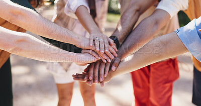 Buy stock photo Outdoor, friends and hands stack for hiking, teamwork or motivation for trekking adventure together. Group activity, collaboration or people with huddle for bonding, support or solidarity for fitness
