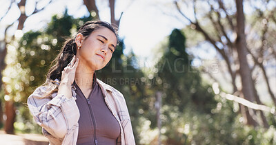 Buy stock photo Outdoor, hiking and woman with neck pain, hurt and discomfort with muscle tension in nature or trip. Travel, accident and person with joint strain, traveler and massage for sore injury in forest