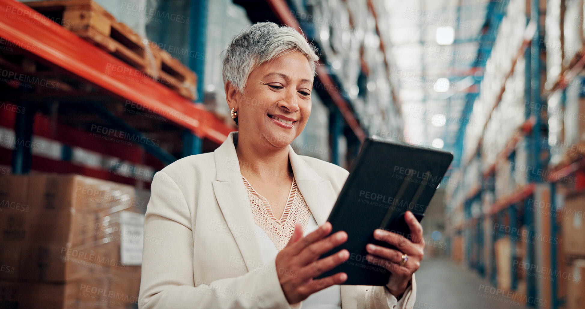 Buy stock photo Smile, woman and reading with tablet at warehouse for logistics, stock check and supply chain. Mature person, digital and research on quality assurance, inventory management and distribution schedule