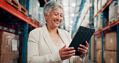 Buy stock photo Happy, woman and reading with tablet at warehouse for logistics, stock check and supply chain. Mature person, digital and research on quality assurance, inventory management and distribution schedule
