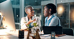 Night, businesswomen and idea in office with computer, financial review or discussion for company audit. Late, black people and talk in workplace with desktop, finance report and plan for accounting.