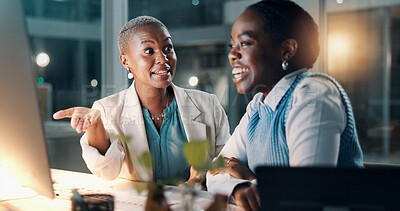 Buy stock photo Night, happy people and talk in office with computer, financial proposal or deadline for company audit. Late, black women and discussion with desktop, finance report and idea planning for accounting.