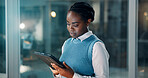 Night, reading or black woman in agency with tablet, draft edit or source feedback for article. Bokeh, review or journalist in workplace with tech, fact check or industry research in late shift.