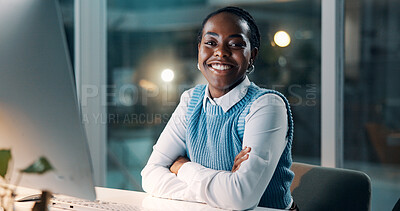 Buy stock photo Happy woman, computer and arms crossed at night in office, portrait and project management at company. African person, writer and journalist with overtime, smile and pc at creative agency in Nigeria