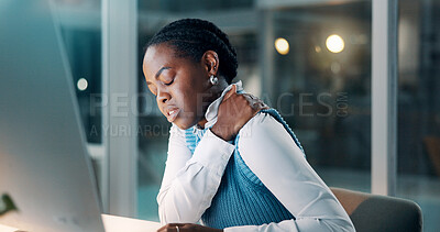 Buy stock photo Tired, computer and shoulder pain with business black woman for night, fatigue and report deadline. Overtime, bokeh and burnout with person in agency for online research, injury and workaholic