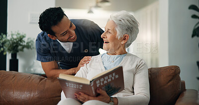 Buy stock photo Reading, home and caregiver with senior woman with hobby for assisted living, help and volunteer. Retirement, support and happy man check up on elderly person with literature, novel or book to relax 