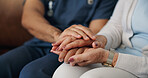 Hands, caregiver and comfort with old woman in home for empathy, support and medical results. Person, reassurance and consoling with elderly patient, healthcare diagnosis and assisted living at house