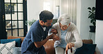 Man, nurse and helping senior patient with walking stick on sofa for assisted living in home. Male person, caregiver and lifting elderly woman with cane for physiotherapy, muscle recovery or aid