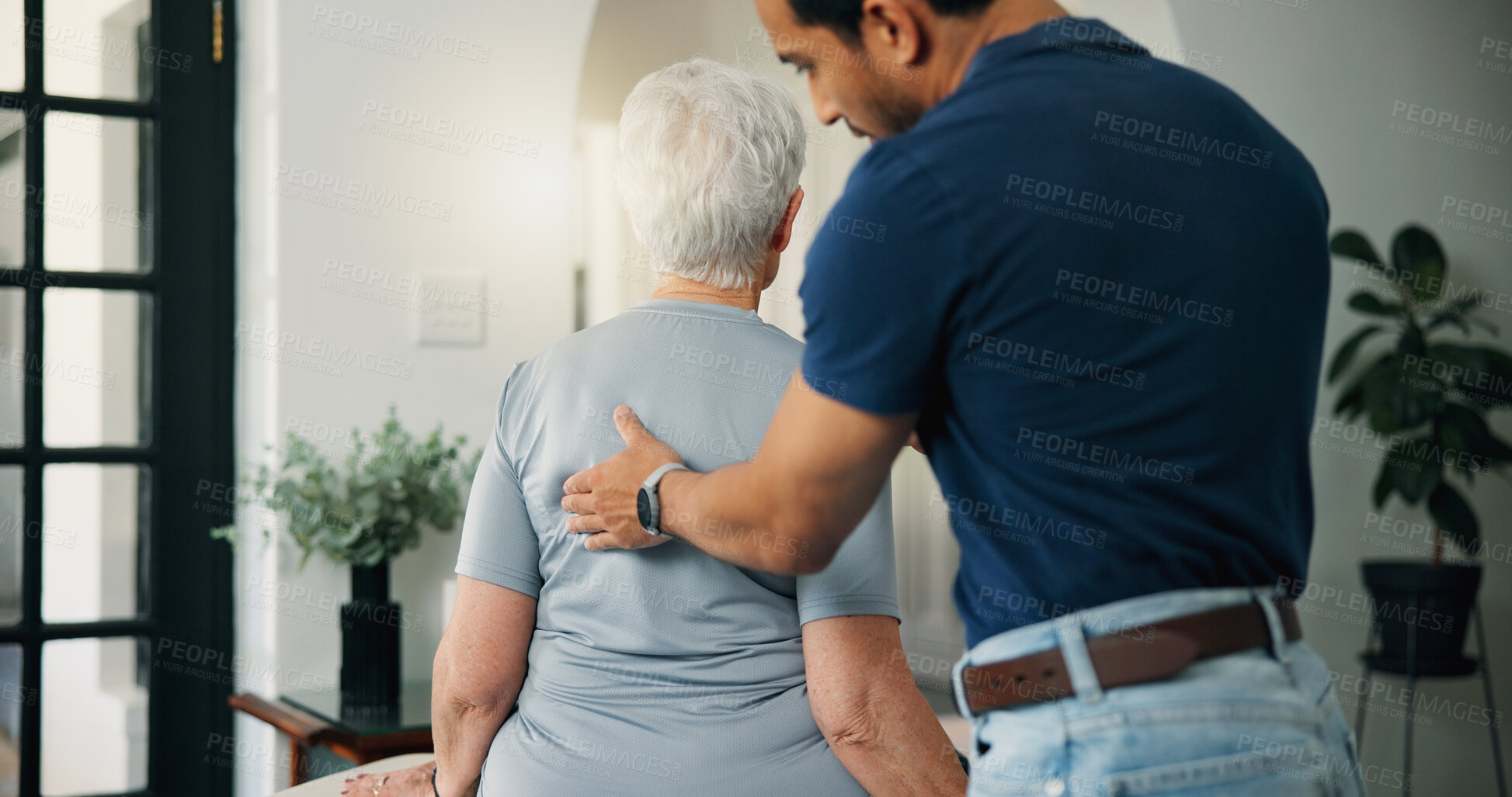 Buy stock photo Old woman, chiropractor and consultation in nursing home with back assessment, support and healing. Senior person, orthopedic worker and help in retirement center for spine injury, recovery and exam.