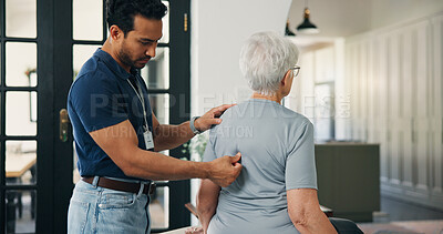 Buy stock photo Old woman, chiropractor and consultation in nursing home with back pain, support or rehabilitation. Senior person, orthopedic worker and check in retirement center for spine injury, recovery or help.