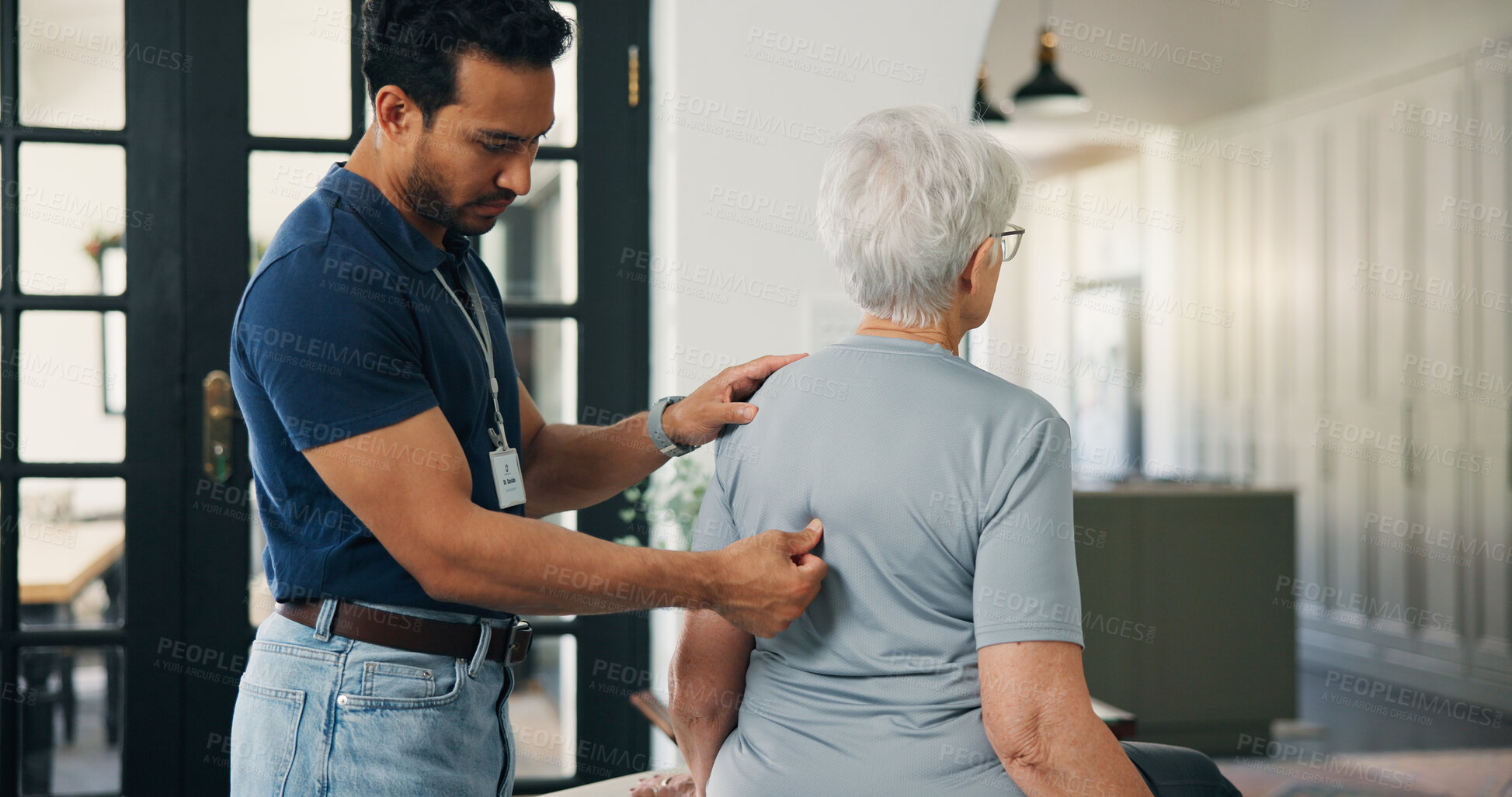 Buy stock photo Old woman, chiropractor and consultation in nursing home with back pain, support or rehabilitation. Senior person, orthopedic worker and check in retirement center for spine injury, recovery or help.