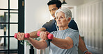 Man, physiotherapy or senior patient with dumbbell for weightlifting exercise or strength training. Male person, physio or elderly woman with arm weight for fitness or muscle recovery in house