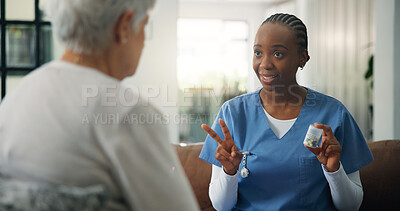 Buy stock photo Nurse, senior woman and pills for healthcare prescription, treatment dose or wellness in home. Caregiver, elderly person and medicine in house, medical instruction or explain medication schedule