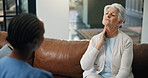 Consulting, medical and neck of old woman with nurse on sofa for help or home appointment. Feedback, healthcare or throat of senior patient with caregiver in apartment for assisted living checkup