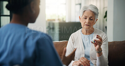 Buy stock photo Consulting, medical and pills of old woman with nurse on sofa for help or home appointment. Feedback, healthcare or medication of senior person with caregiver in apartment for assisted living checkup