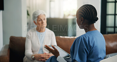 Buy stock photo Discussion, senior woman and caregiver with tablet in home, health evaluation and medical counseling. Listening, tech and elderly person with nurse for wellness assessment, results or diagnosis talk