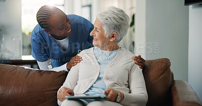Buy stock photo Smile, caregiver and old woman with tablet at house for good news, medical results and telehealth. Happy, nurse and senior person with digital for healthcare report, online survey and assisted living