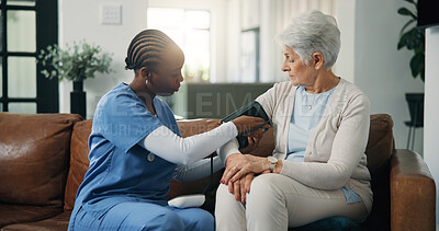 Buy stock photo Blood pressure, elderly patient or caregiver on sofa, hypertension check or machine to measure heart rate. Consultation, senior care or nurse with health assessment, medical exam or people in home