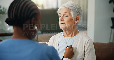 Buy stock photo Consulting, healthcare or stethoscope with old woman and nurse on sofa for help or home appointment. Cardiology, chest or medical with caregiver and senior patient in apartment for insurance checkup