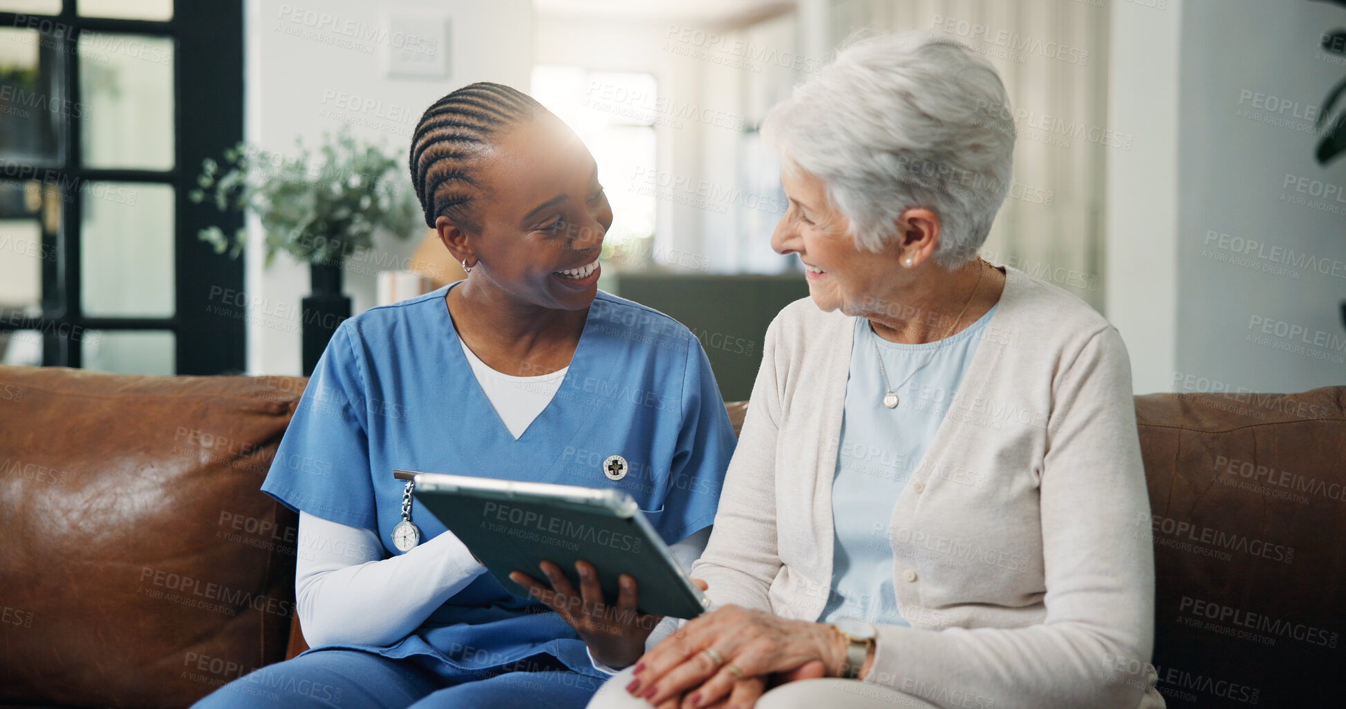 Buy stock photo Happy, caregiver and old woman with tablet at house for good news, medical results and telehealth. Smile, nurse and senior person with digital for healthcare report, online survey and assisted living