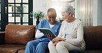Caregiver, senior woman and tablet in home with good news, medical results and telehealth. Nurse, laughing and elderly person with digital app for healthcare report, online survey and assisted living