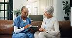 Tablet, nurse and old woman in home for healthcare, homecare and report in retirement. Caregiver, patient and elderly person with technology in house, medical wellness and results in consultation